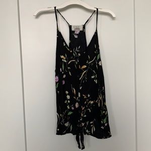 Flowery black button down tank top.